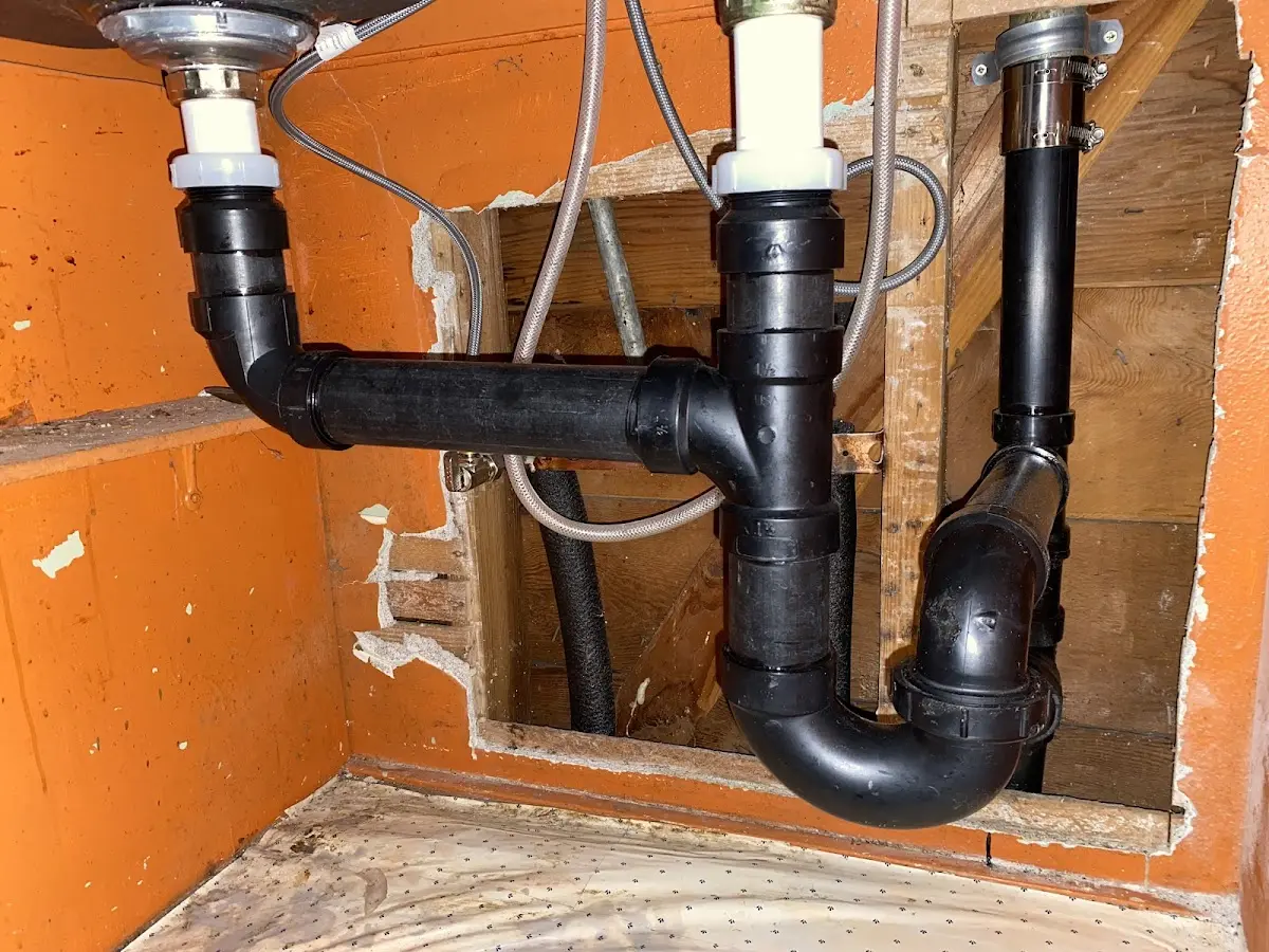 Professional Garbage Disposal Repair equipment and tools on the job in South Strabane